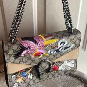 Tan beautifully embordered luxury shoulder bag with change strap